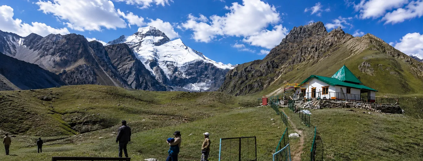 Snow-covered Himalayan mountain representing the Om Parvat darshan route